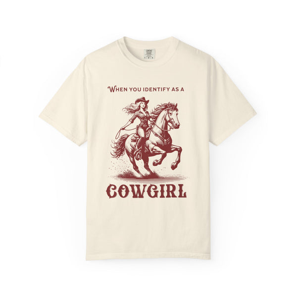 Model wearing an oversized 'When You Identify as a Cowgirl' T-Shirt with a western-inspired design. Soft, vintage-washed cotton, perfect for country-core and cowgirl aesthetic lovers.