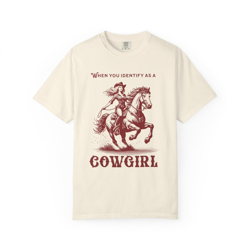 Model wearing an oversized 'When You Identify as a Cowgirl' T-Shirt with a western-inspired design. Soft, vintage-washed cotton, perfect for country-core and cowgirl aesthetic lovers.