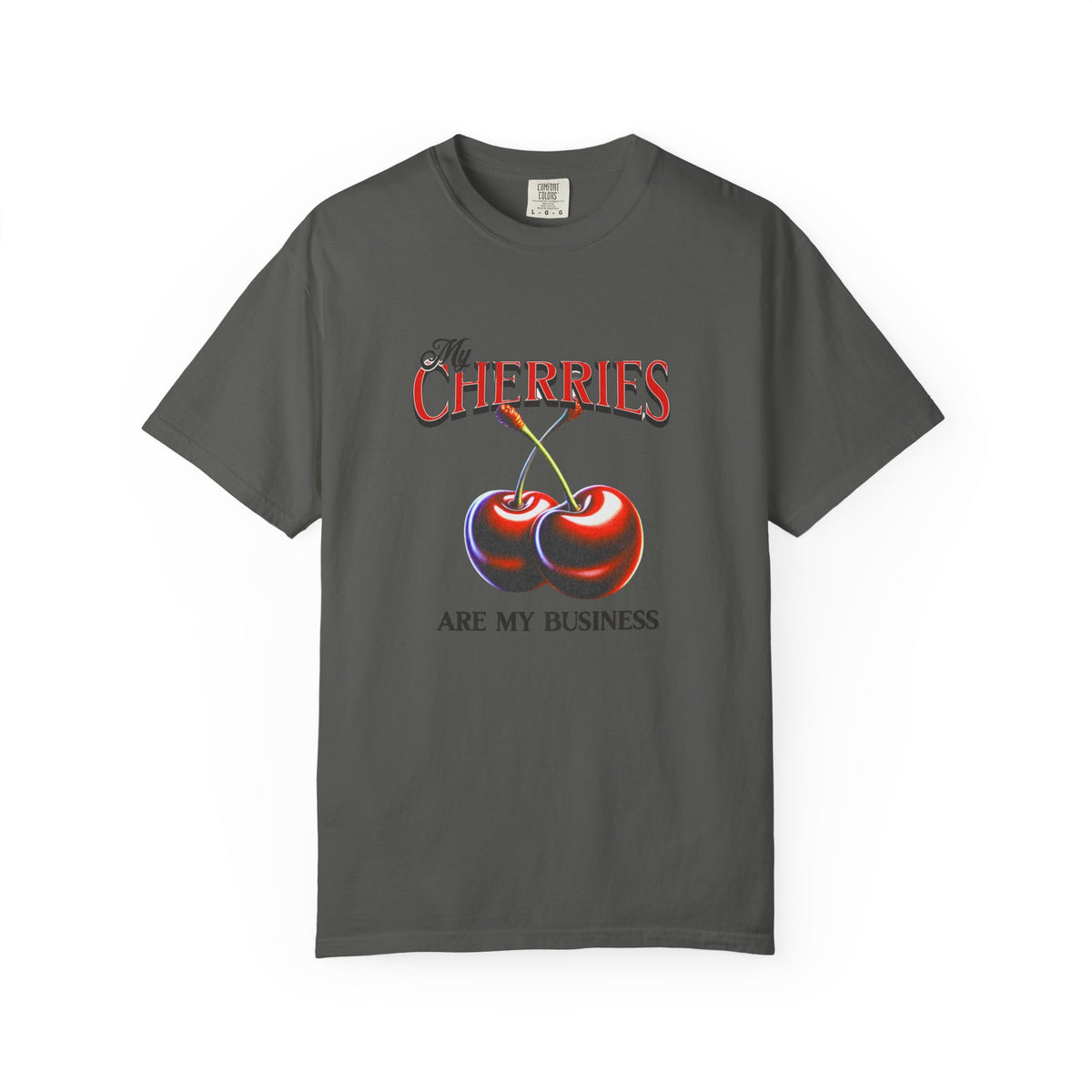 Cream oversized vintage-style t-shirt featuring a bold graphic of two red cherries and the text “My Cherries Are My Business.” A flirty and confident design perfect for making a bold statement.

