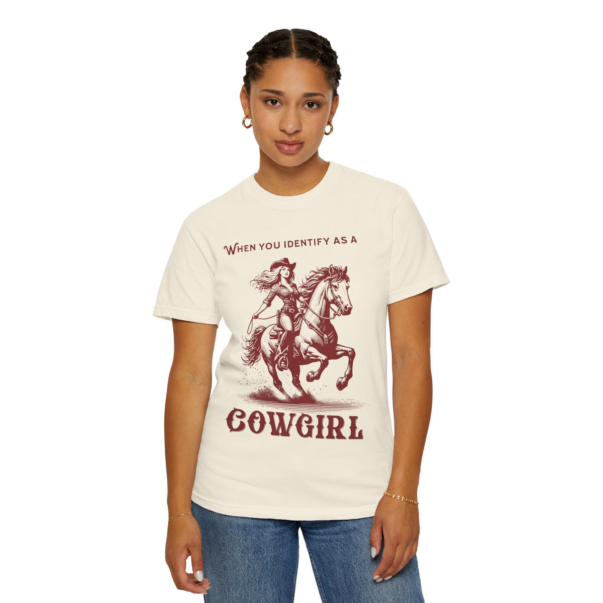 Model wearing an oversized 'When You Identify as a Cowgirl' T-Shirt with a western-inspired design. Soft, vintage-washed cotton, perfect for country-core and cowgirl aesthetic lovers.