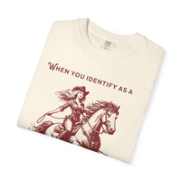 Model wearing an oversized 'When You Identify as a Cowgirl' T-Shirt with a western-inspired design. Soft, vintage-washed cotton, perfect for country-core and cowgirl aesthetic lovers.
