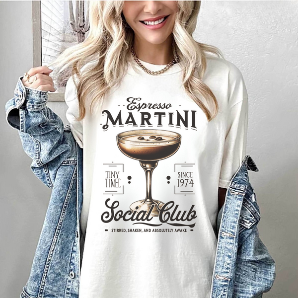 Vintage-washed oversized t-shirt featuring an espresso martini glass with coffee beans floating, a must-have for coffee & cocktail lovers